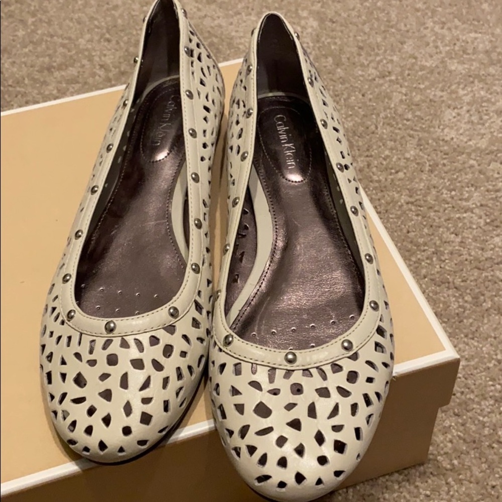 White perforated leather flats